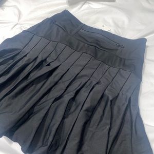 Black tennis/golf skirt. NEVER BEEN WORN